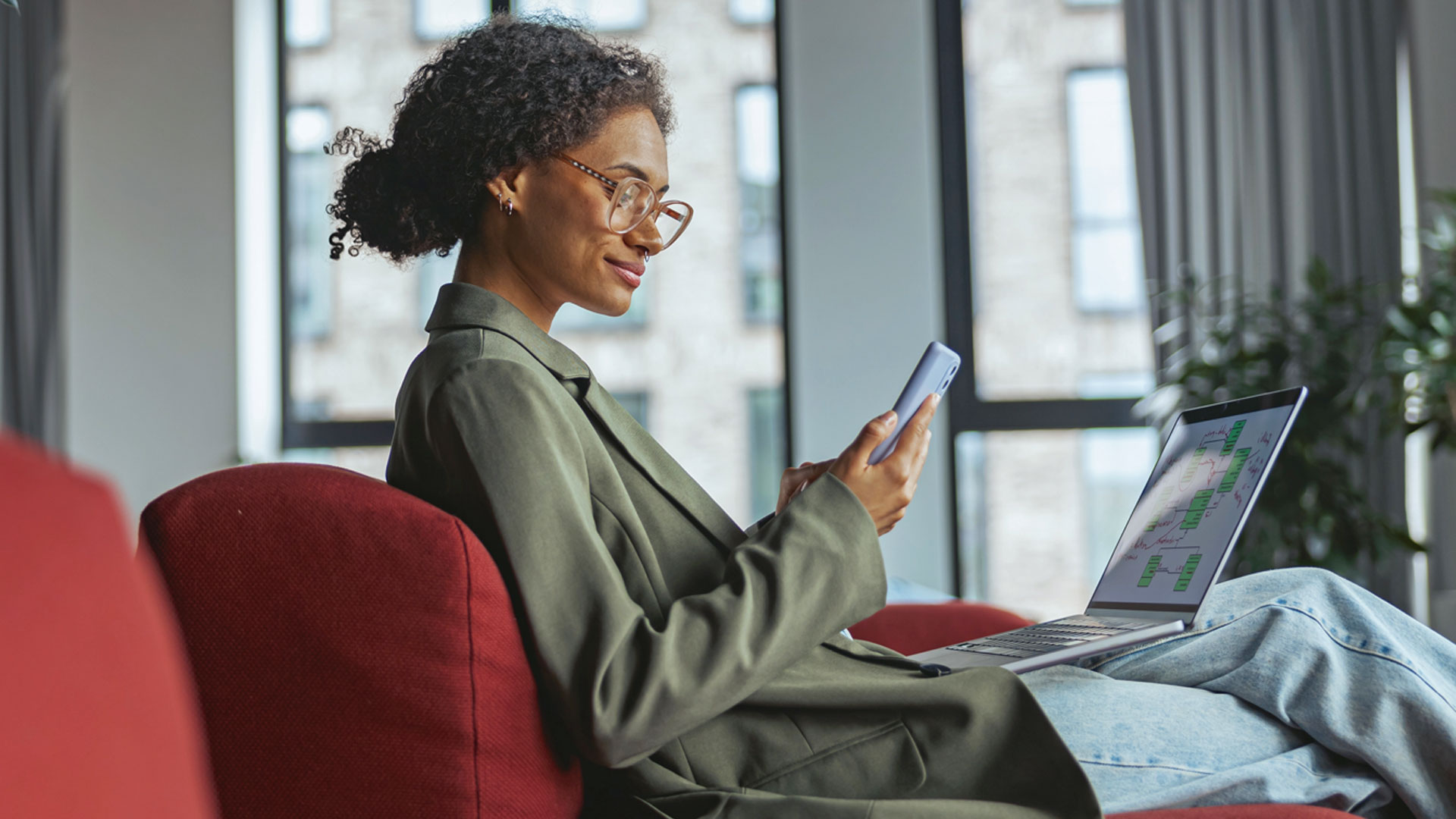 woman-working-remotely-phone-laptop